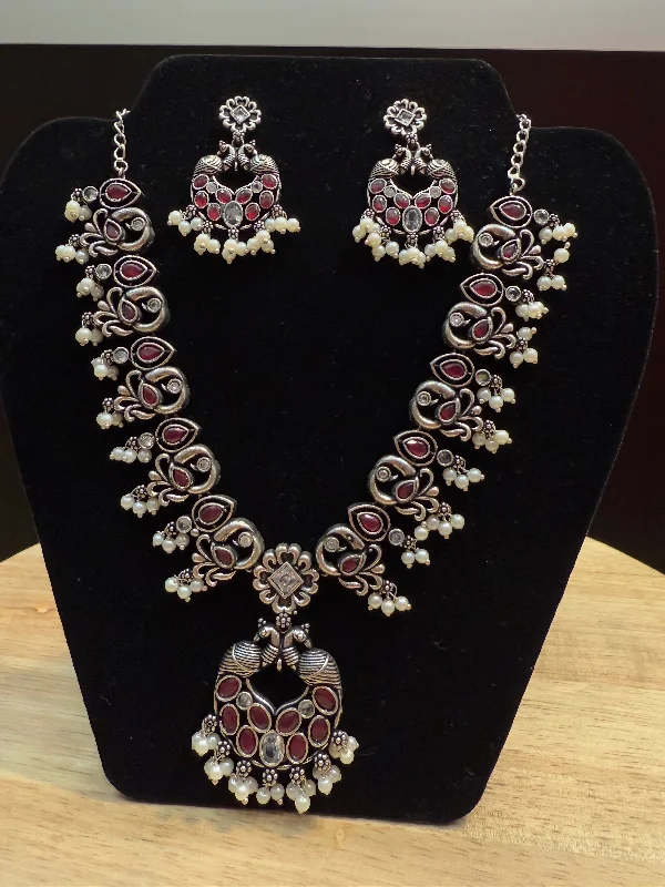 women's necklaces celestial design -Mesmerizing Maroon Color Peacock Design Oxidized Jewelry Necklace With Earrings