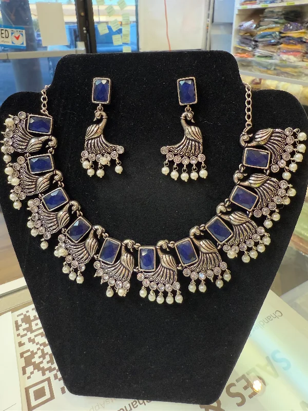 women's necklaces with flower design -Amazing Blue Stone Studded German Silver Plated Oxidized Necklace Set With Earrings And Pearl Beads